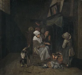 Kücheninterieur mit versammelter Familie beim Pfannkuchen backen